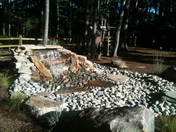 waterfall feature in residential landscaping project